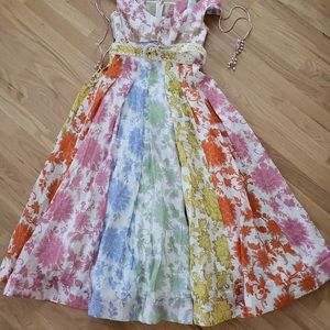 Linen, fitted, lined midi skirt, side pockets, raffia belt.